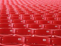 Red 3,4 and 5 Empty seats at the Jay Pritzker Pavilion at Millenium Park, Chicago.